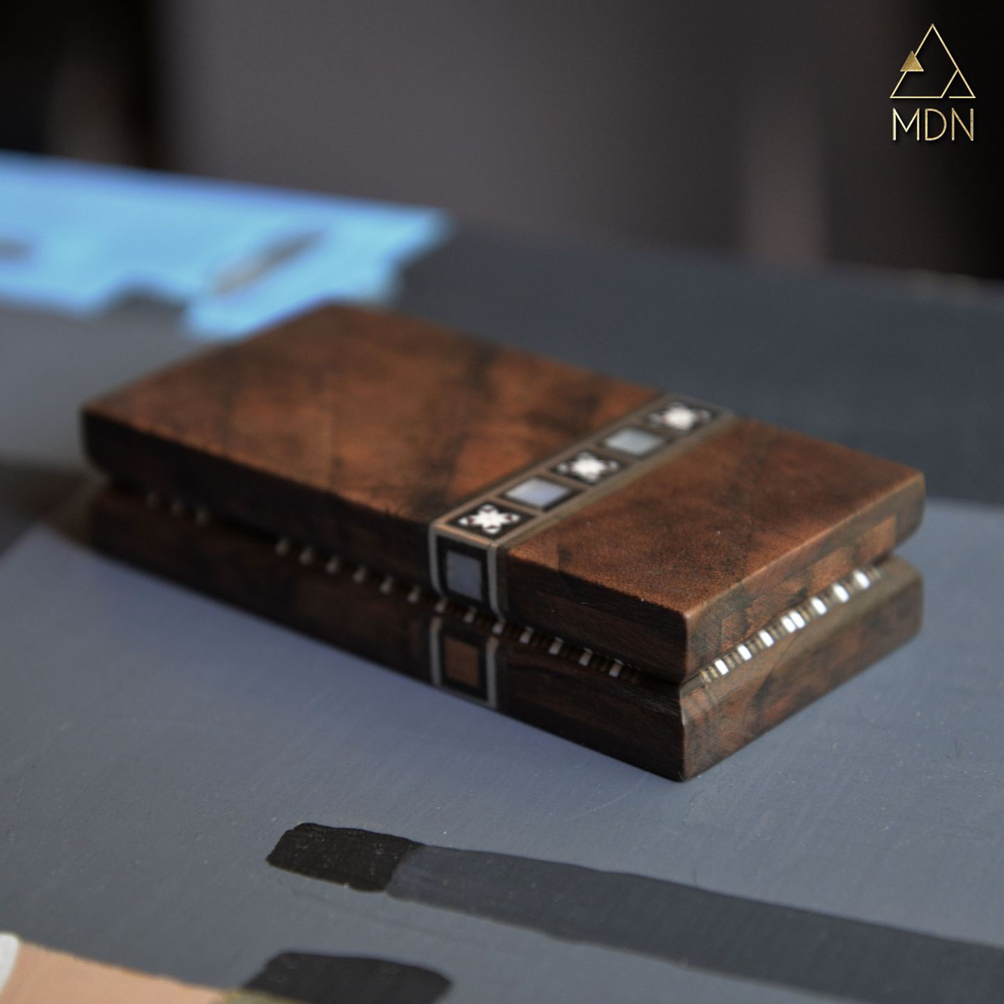 Decorative box with mosaic inlay and metal accents