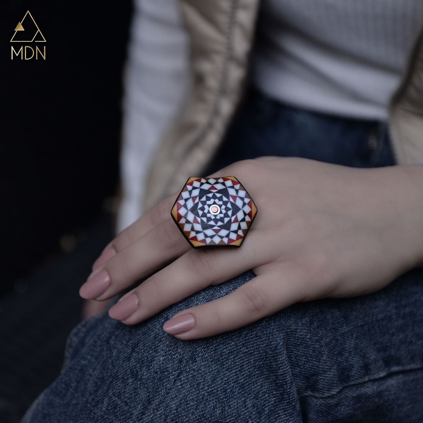 Hexagonal ring with silver-toned geometric mosaic inlay