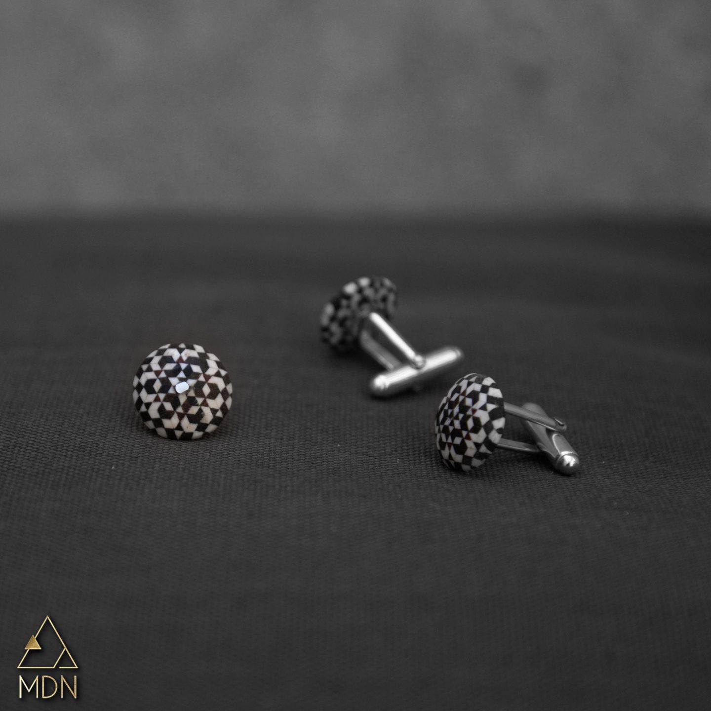 Cufflinks with silver-toned textured geometric pattern