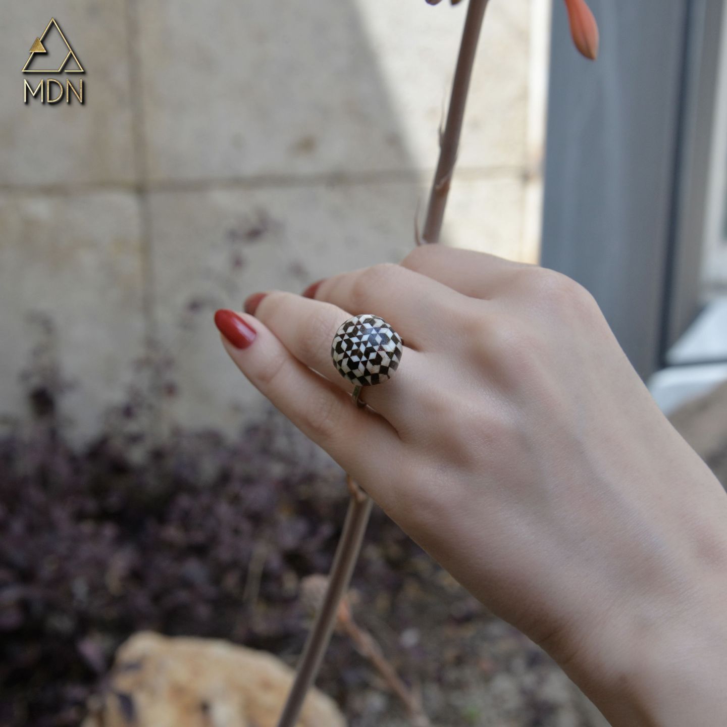Ring with silver-toned geometric textured dome pattern
