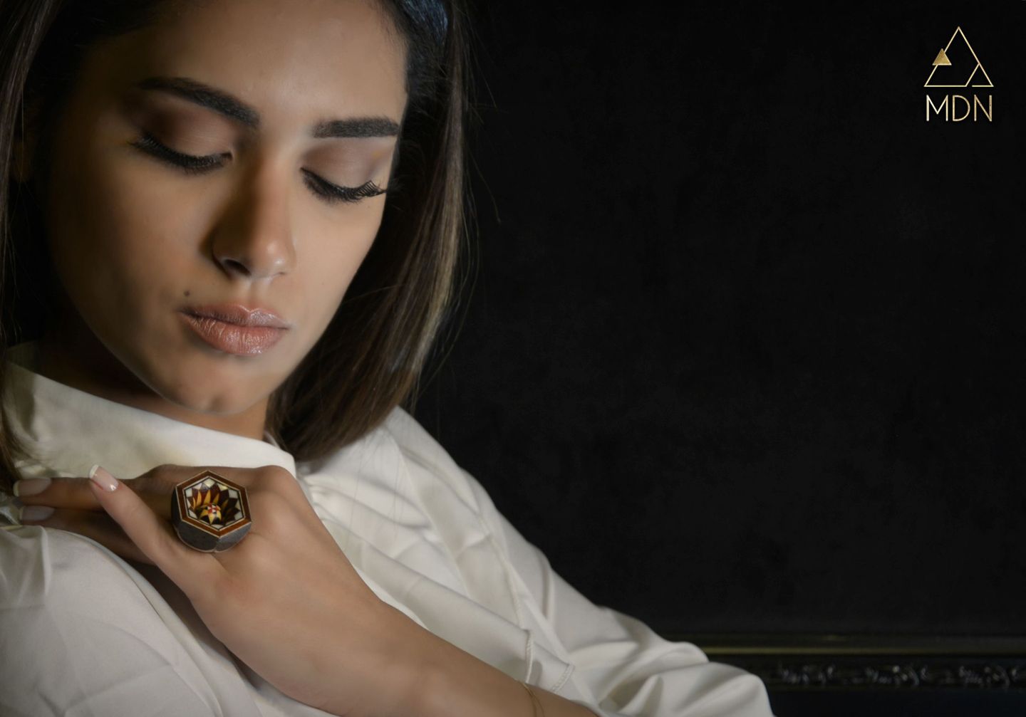 Ring with wood mosaic inlay in geometric pattern