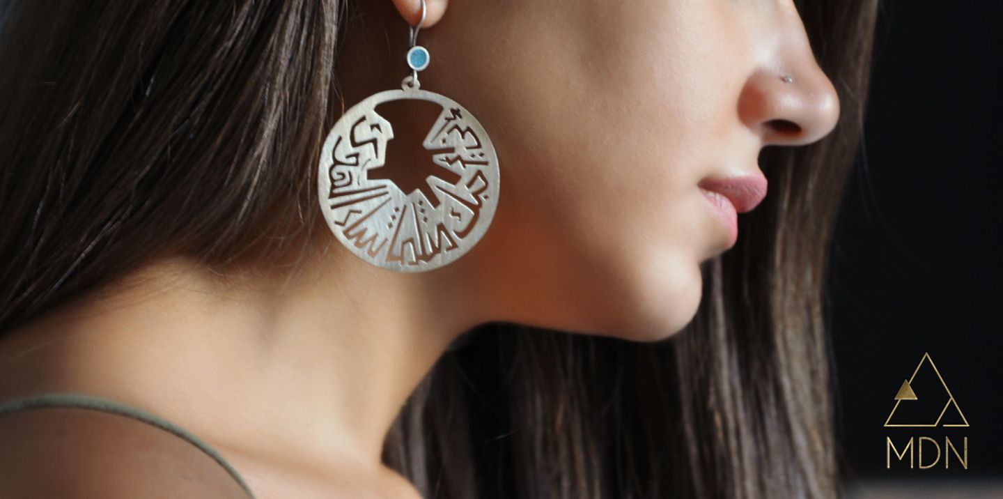Earrings with circular mosaic pattern, turquoise stone, and Arabic calligraphy "اني أحبك مثلما شاء الهوى".